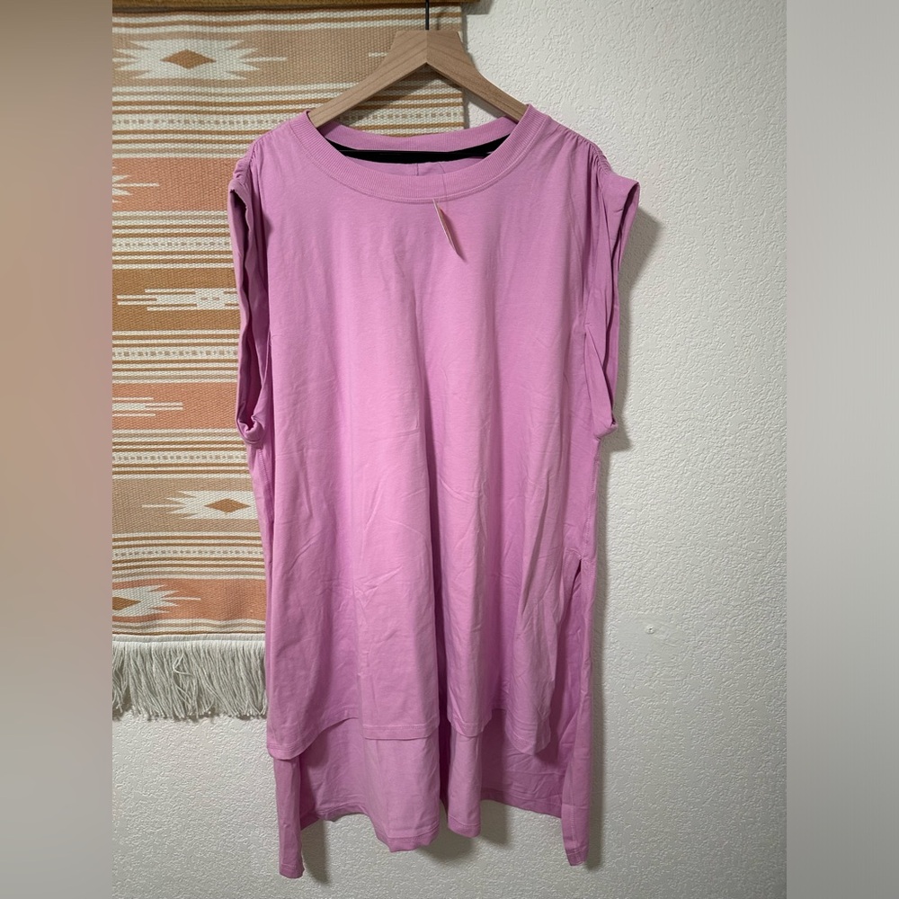 NWT Free People Movement high-low top. Size M